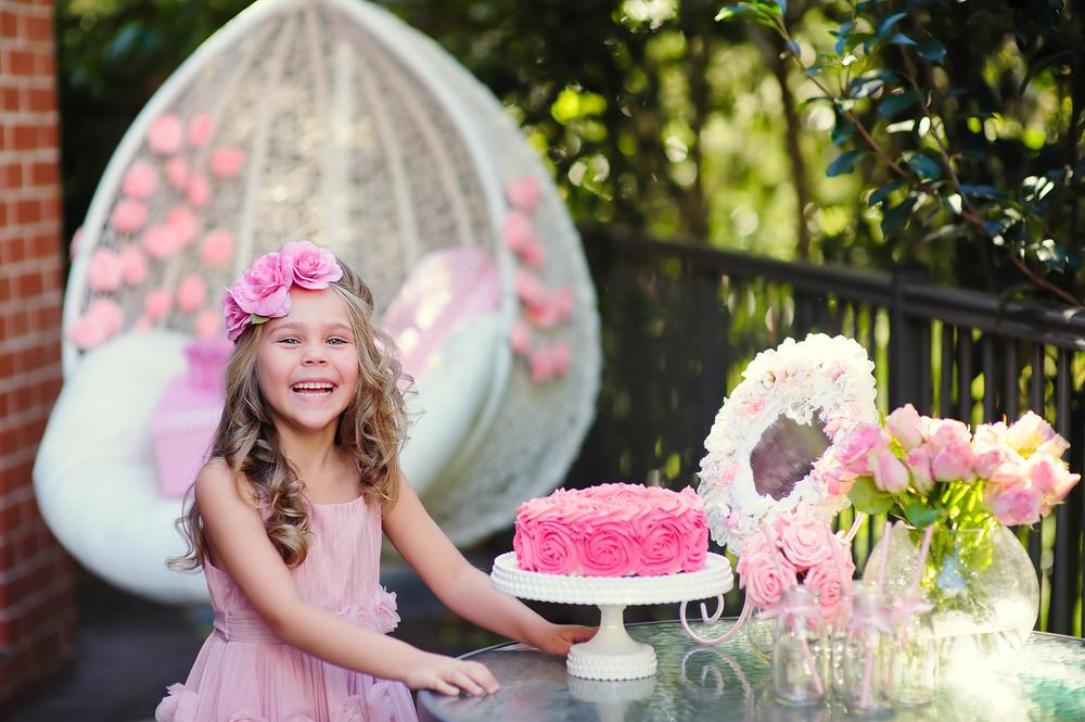 Little girl enjoying a pink themed birthday party