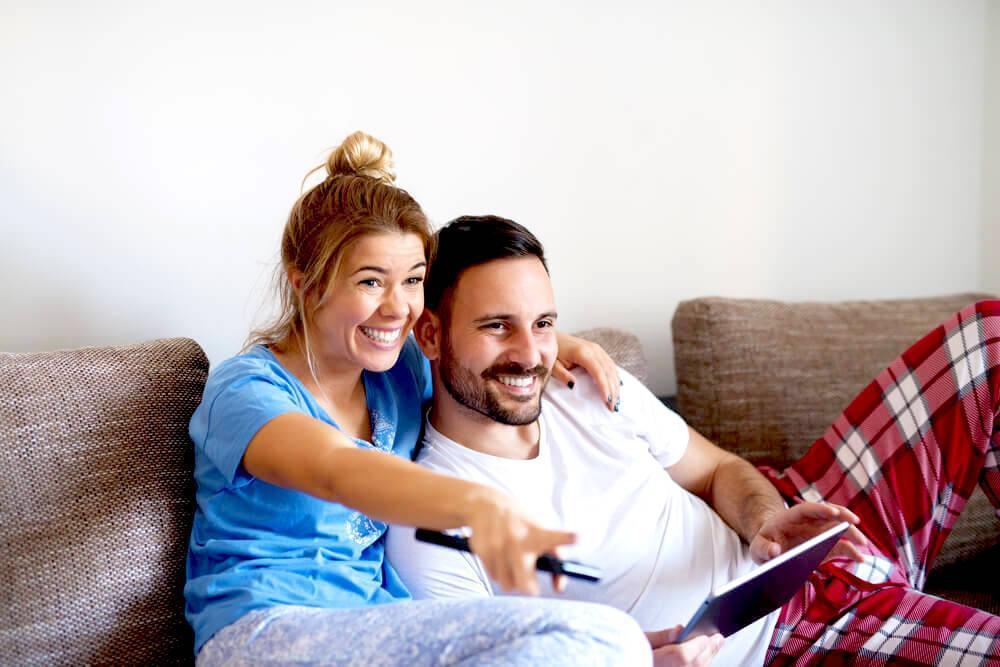 couple watching TV from the couch