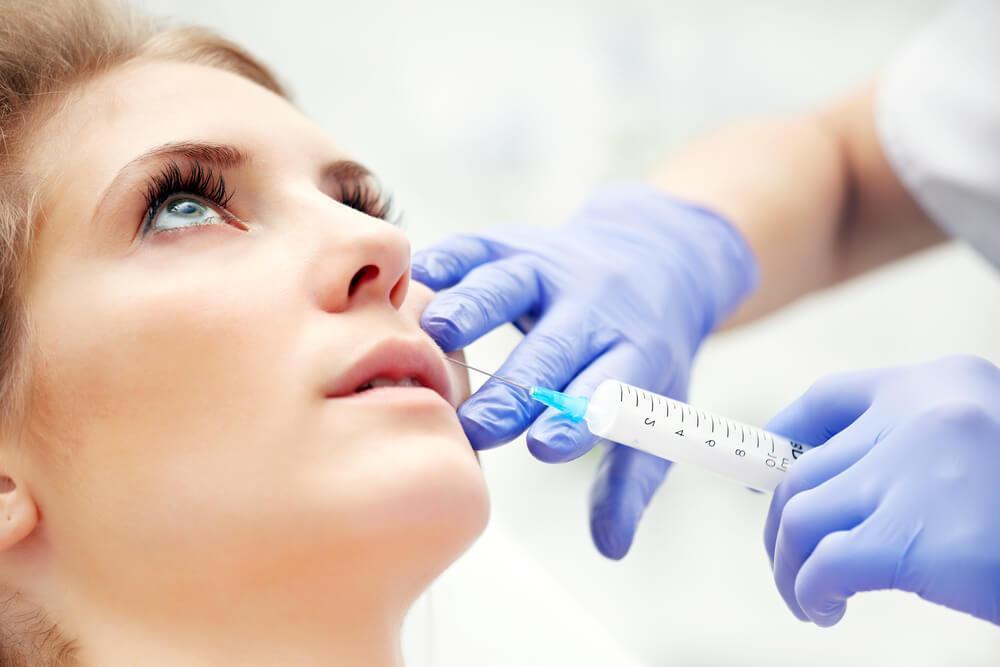 woman receiving botox injection