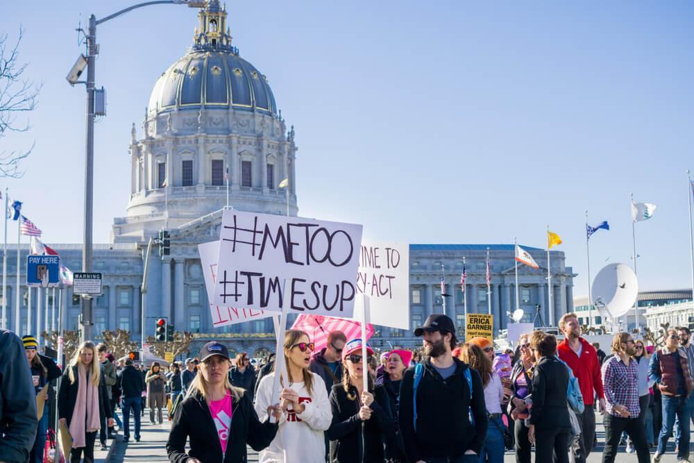 January 20, 2018 San Francisco / CA / USA - Women's March protesters begin to walk; #metoo and #timesup slogans written on a sign at the rally held in front of the City Hall