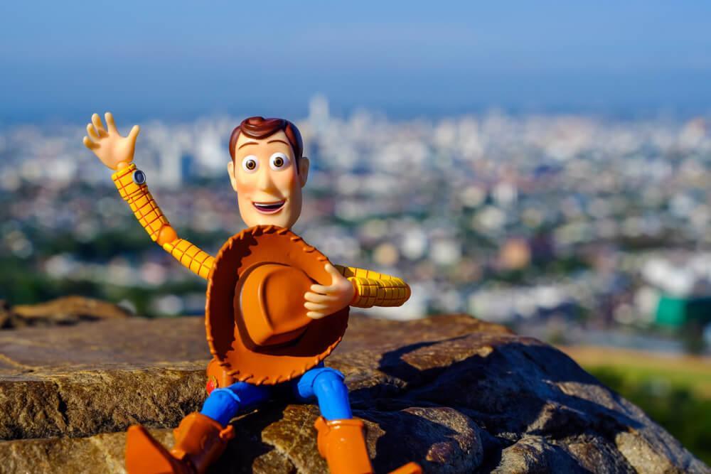 Songkhla, Thailand - August 8, 2018: Woody toy greetings The scenery behind is the atmosphere.This figure by disney Pixar inc.