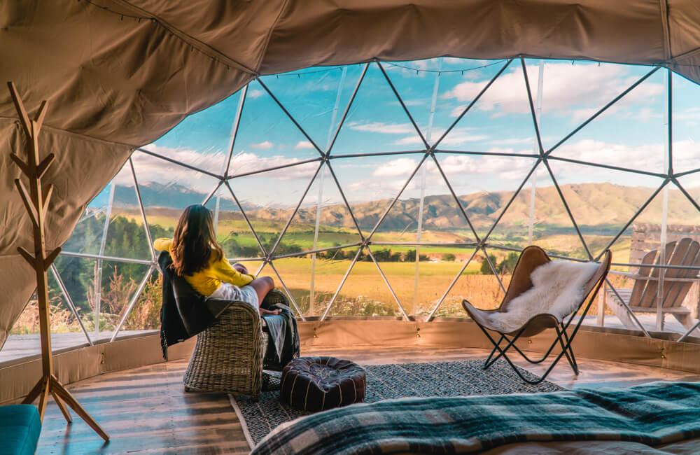 Woman in glamping tent