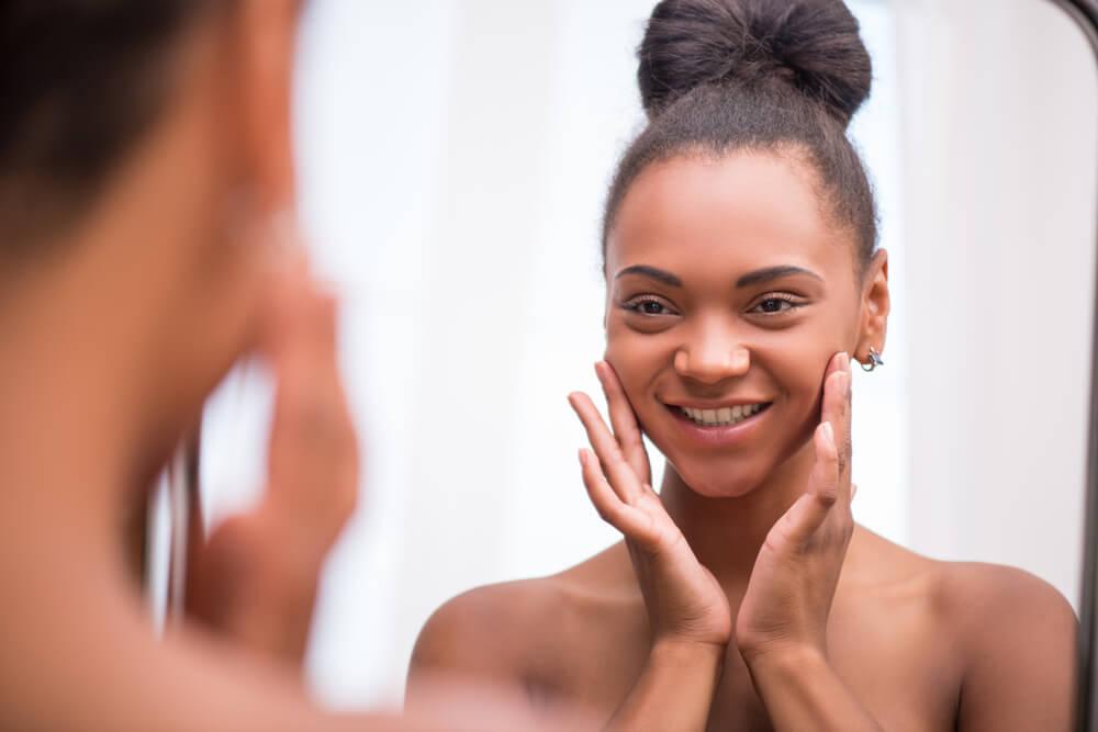 Woman looking in mirror