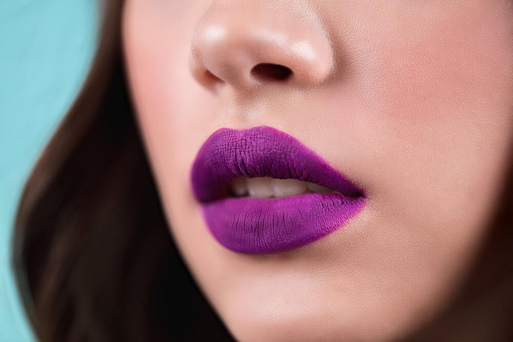 Lips with purple lipstick