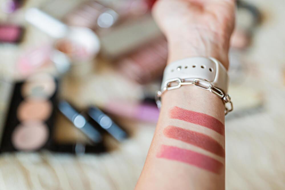 Lipstick swatches on wrist