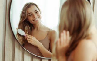 woman brushing hair